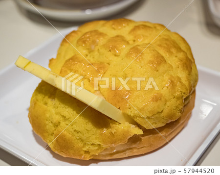 Buttered pineapple bun in dish 57944520