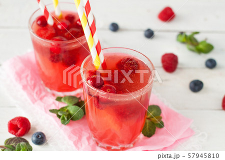 Iced lemonade with berries 57945810