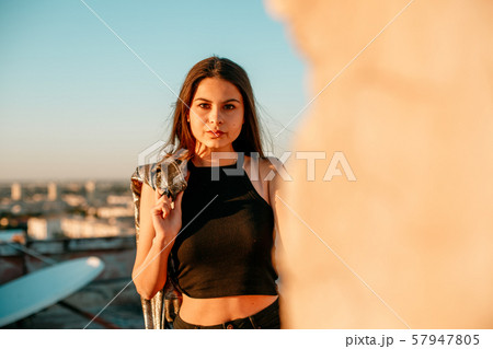 portrait of a young brunette girl in black 57947805