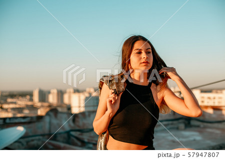 portrait of a young brunette girl in black 57947807