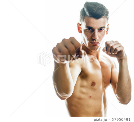 young handsome agressive man boxing isolared on white background, lifestyle sport people concept 57950491