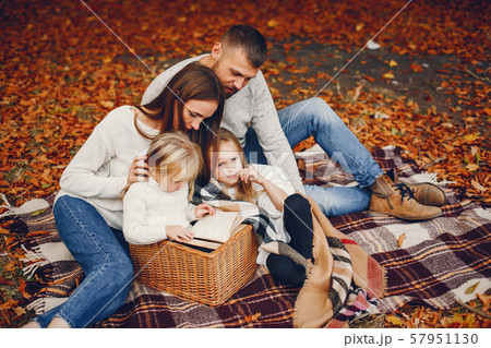 Family with cute kids in a autumn park 57951130