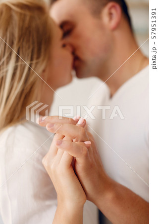 Beautiful couple spend time in a kitchen 57951391
