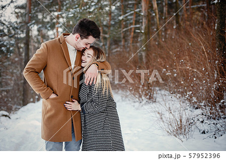 happy couple walking through the park 57952396