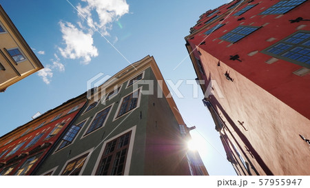 Multicolored old houses in Stockholm. Beautiful European architecture, the sun shines from behind 57955947