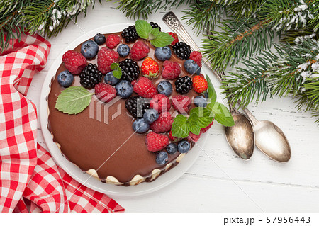 Cheesecake with berries and chocolate 57956443