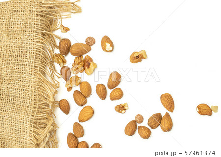 Brown almond nut on white Brown almond nut on white 57961374
