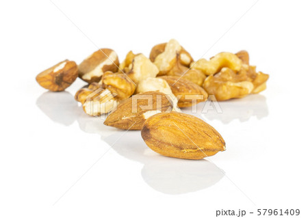 Brown almond nut isolated on white Brown almond nut isolated on white 57961409