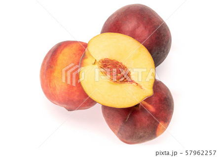 Fresh fuzzy peach isolated on white Fresh fuzzy peach isolated on white 57962257