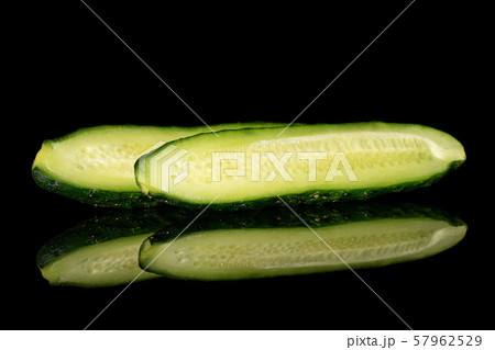 Fresh green cucumber isolated on black glass Fresh green cucumber isolated on black glass 57962529
