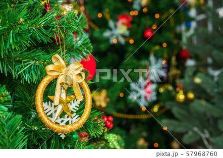 Close up of Colorful balls on Green Christmas tree 57968760