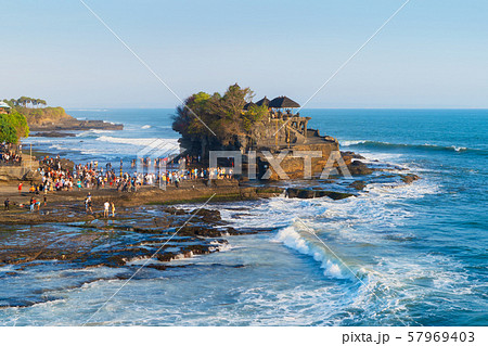 Pura Tanah Lot, the water temple, in Bali at noon. 57969403