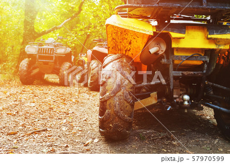 ATV in the forest, in the mud. Wheels and ATV 57970599