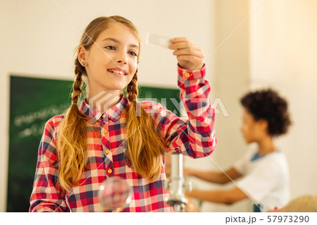 Cute schoolgirl doing scientific exploration with pleasure Cute schoolgirl doing scientific exploration with pleasure 57973290