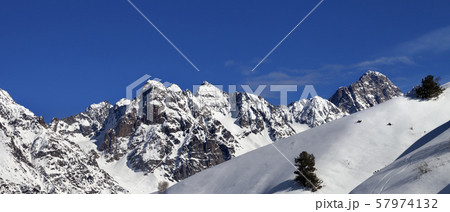 Off-piste slope with track from ski and snowboard 57974132