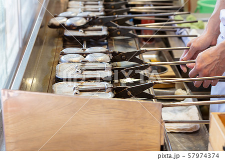 梅ヶ枝餅の看板・提灯　太宰府天満宮の参道、夜の風景 57974374