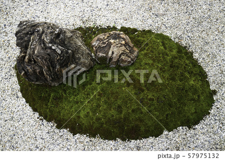Natural stone landscaping in home garden 57975132