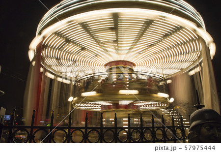 Carousel and Christmas (New Year holidays) decoration in Moscow (at night), Russia 57975444