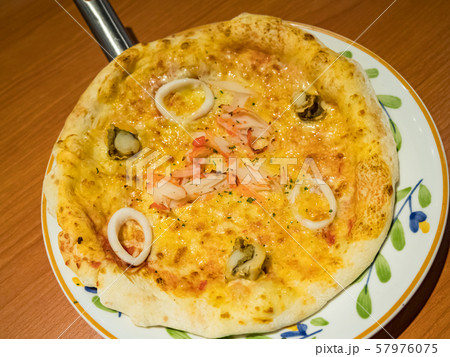 italian bread: Focaccia in dish 57976075