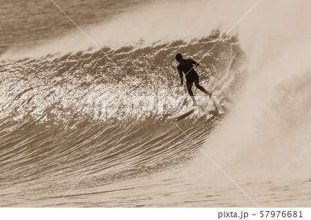 Surfer Surfing Rides Cold Wave Sepia Tone 57976681