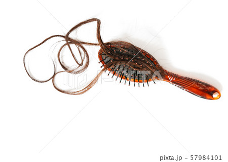 Women with long hair on the hair brush show hair 57984101