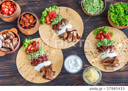 Tacos with fillings Tacos with fillings 57985433