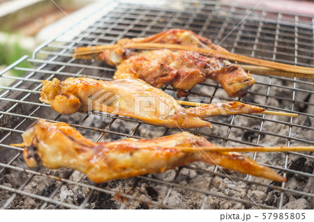 Close of up grilled chicken on the stove. 57985805