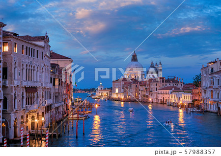 View of Venice Grand Canal and Santa Maria della Salute church in the evening View of Venice Grand Canal and Santa Maria della Salute church in the evening 57988357