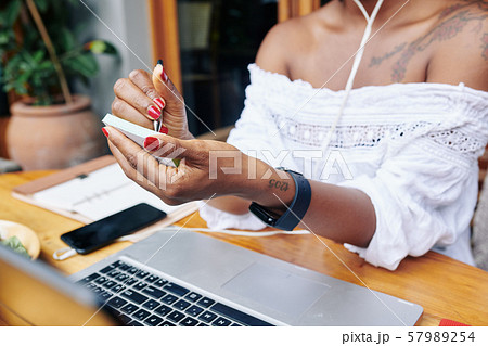 Woman writing her plans 57989254