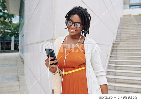 Woman has online conversation 57989355