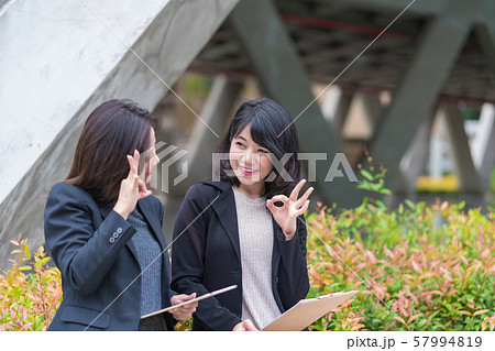 business woman working together with tablet business woman working together with tablet 57994819