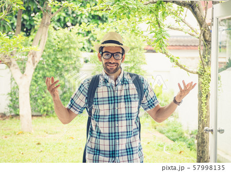 Happy young bearded wearing eye glasses man 57998135
