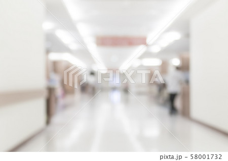 Blur background perspective view of hospital building interior or clinical hallway indoor area 58001732