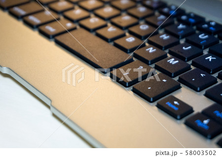 Closeup of laptop keyboard with selective focus Closeup of laptop keyboard with selective focus 58003502