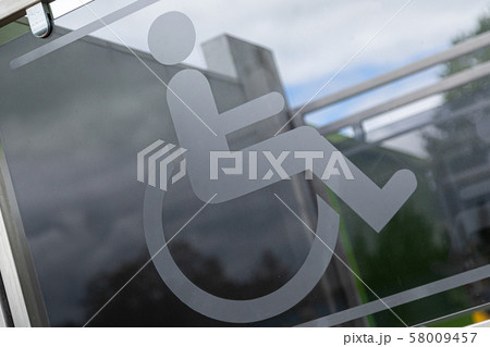Close-up of sign physically handicapped person in wheelchair Close-up of sign physically handicapped person in wheelchair 58009457