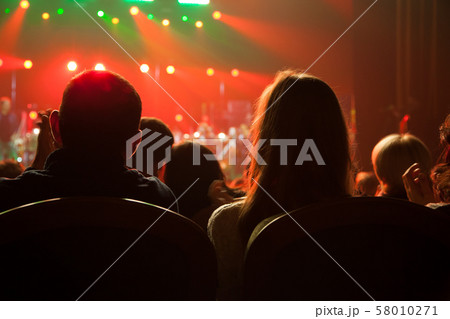 Audience applauded at the concert artists. Audience applauded at the concert artists. 58010271