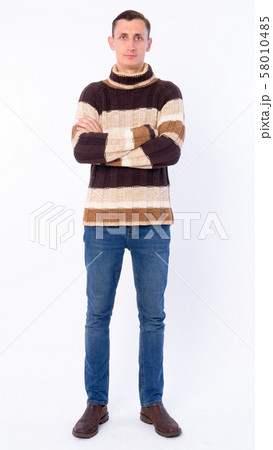 Full body shot of man with arms crossed ready for winter 58010485