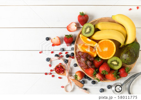 Mixed fresh fruit salad with strawberry with 58011775