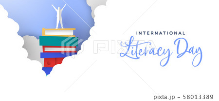 Literacy Day banner man in papercut book mountain 58013389