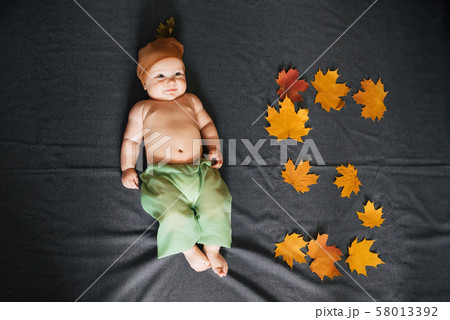 Newborn boy is the view top. Autumn concept of the child of five months 58013392