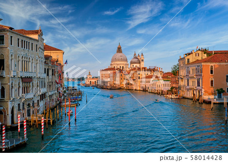 View of Venice Grand Canal and Santa Maria della Salute church on sunset View of Venice Grand Canal and Santa Maria della Salute church on sunset 58014428