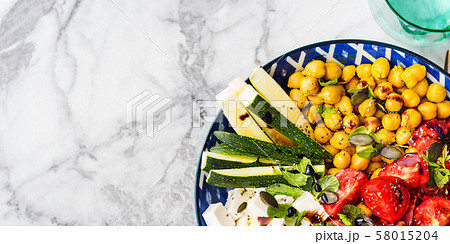 Chickpea watermelon salad with feta and tomatoes Chickpea watermelon salad with feta and tomatoes 58015204