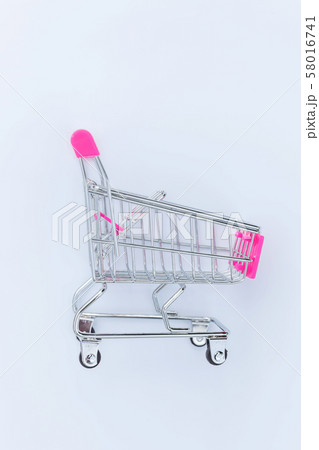 Small supermarket grocery toy push cart on white 58016741