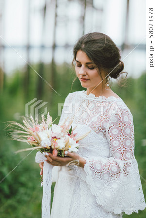 Beautiful smiling bride brunette young woman  58023978
