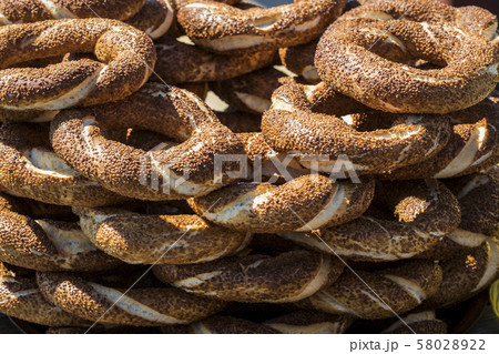 Background with Turkish bagels simit, close-up 58028922