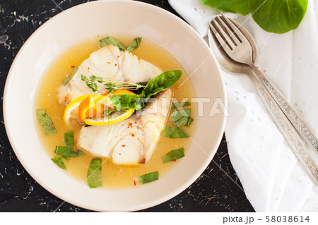 Fried cod with citrus butter sauce Fried cod with citrus butter sauce 58038614