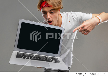 Portrait of student on Gray background for web background design. Gray isolated background. Portrait of student on Gray background for web background design. Gray isolated background. 58038993