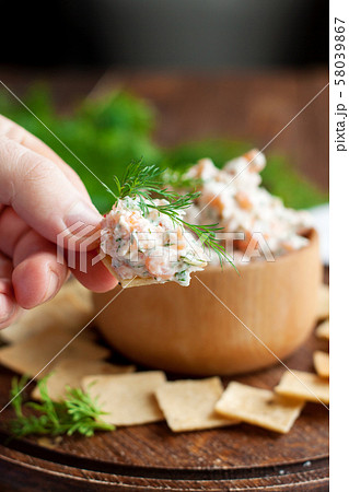 Smoked salmon and cream cheese dip with crackers Smoked salmon and cream cheese dip with crackers 58039867