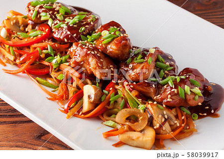 Teriyaki chicken grill with sliced vegetables 58039917