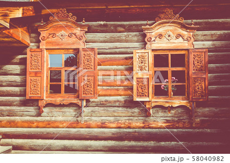 Traditional Siberian wooden house in the Taltsy Architectural-Ethnographic Museum. 58040982